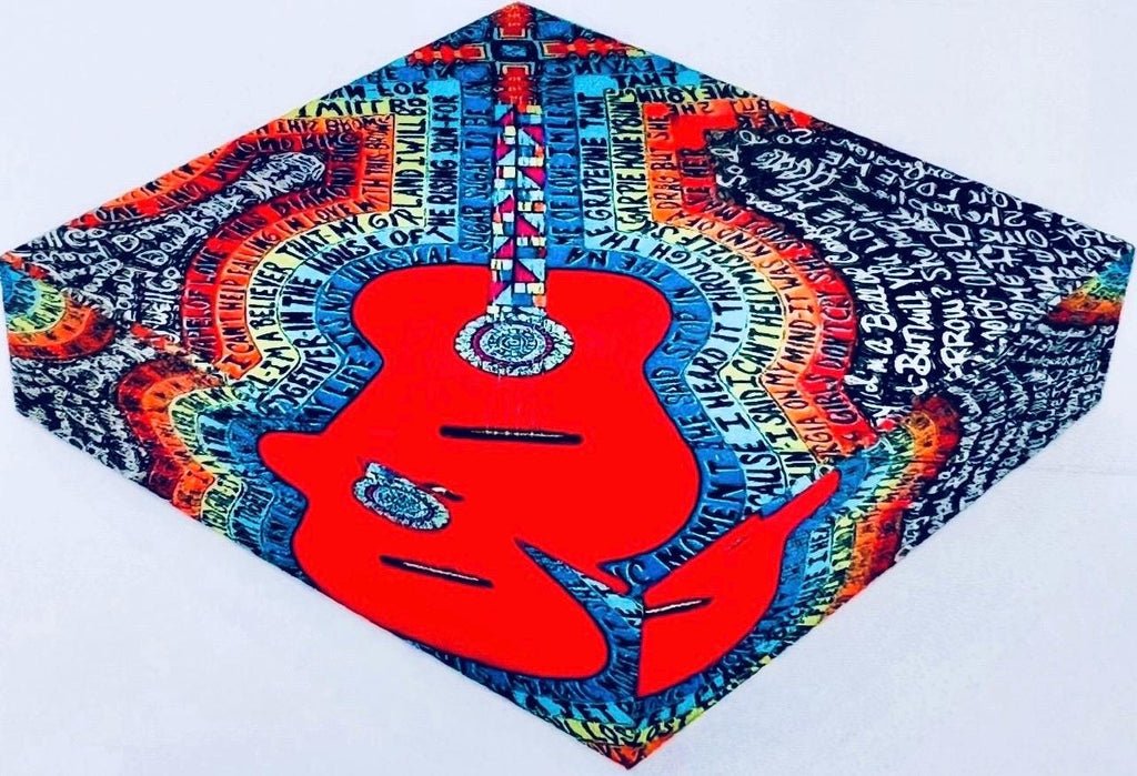 Strummin Glass Paperweight